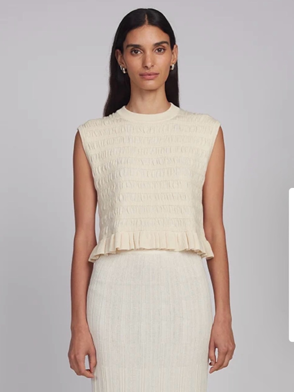 Eleven Six Sleeveless Cream Ruffle-Hem Knit Top